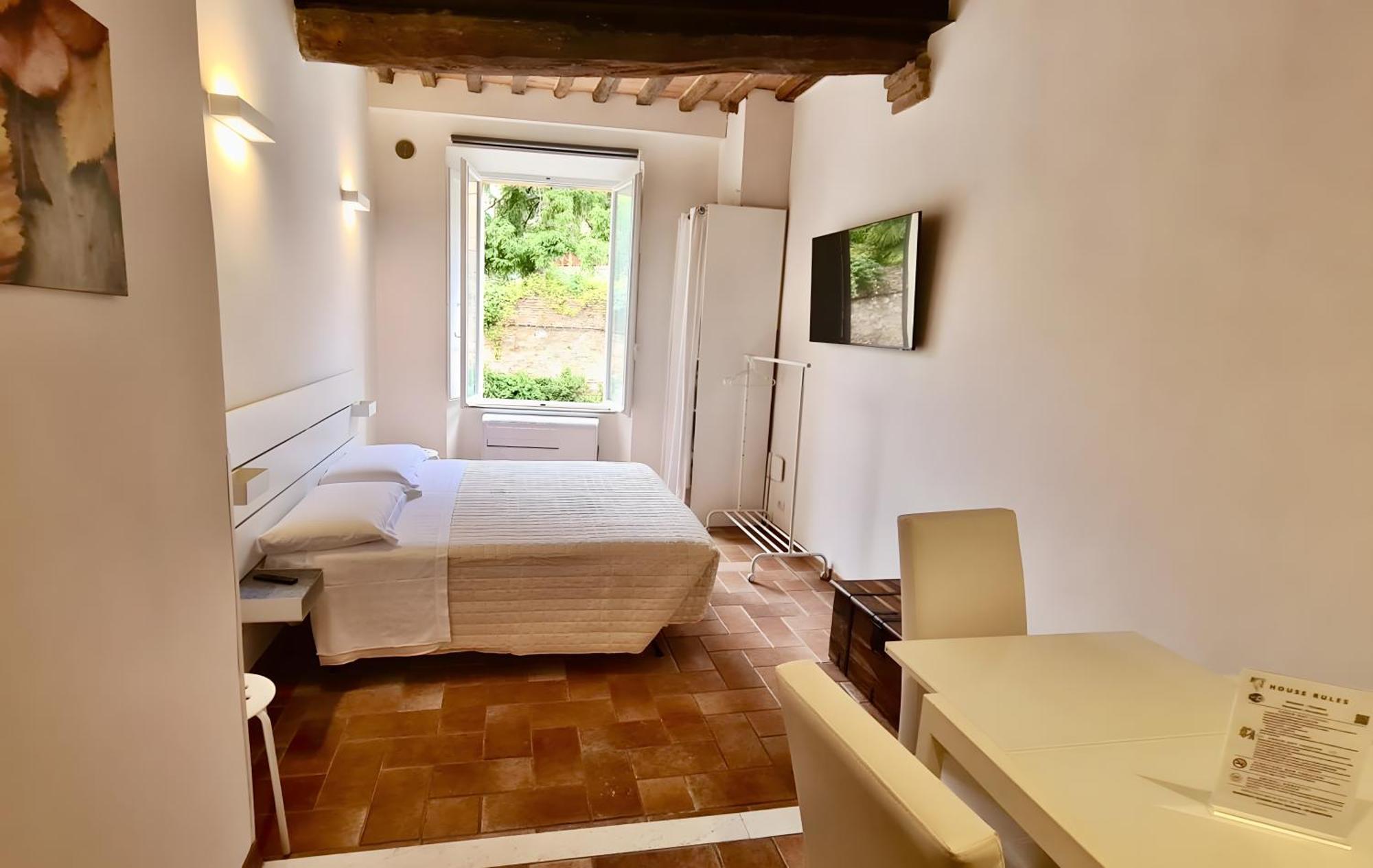 Fontebranda Nest Apartment Siena Bagian luar foto