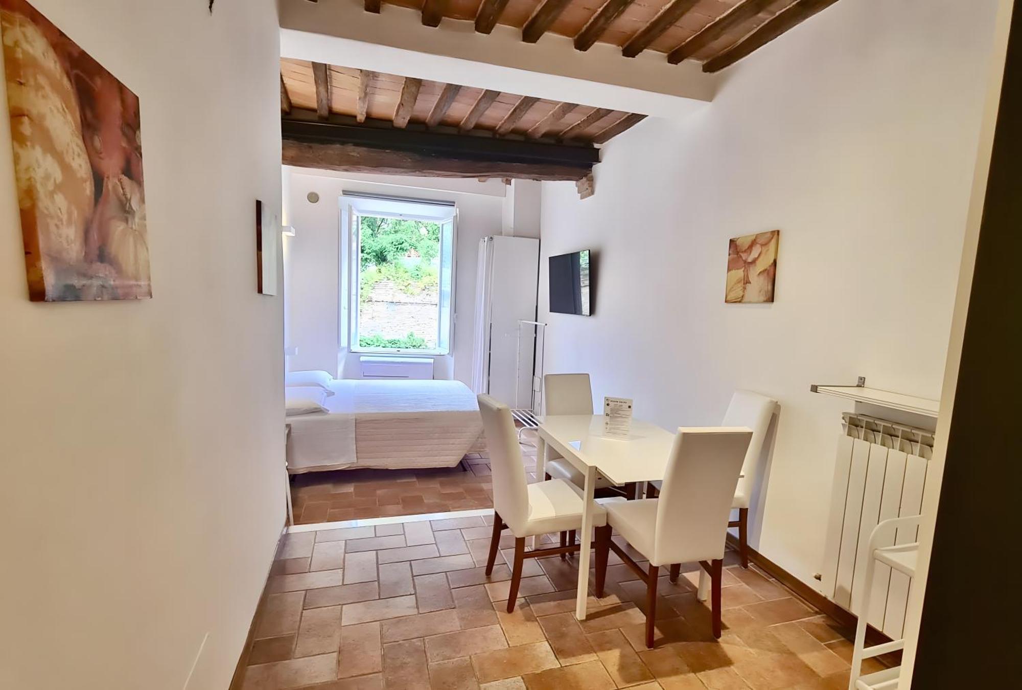 Fontebranda Nest Apartment Siena Bagian luar foto